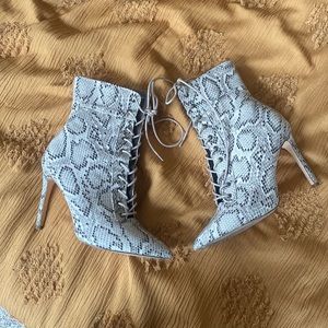 Size 9 lace-up snakeskin booties from Fashionova